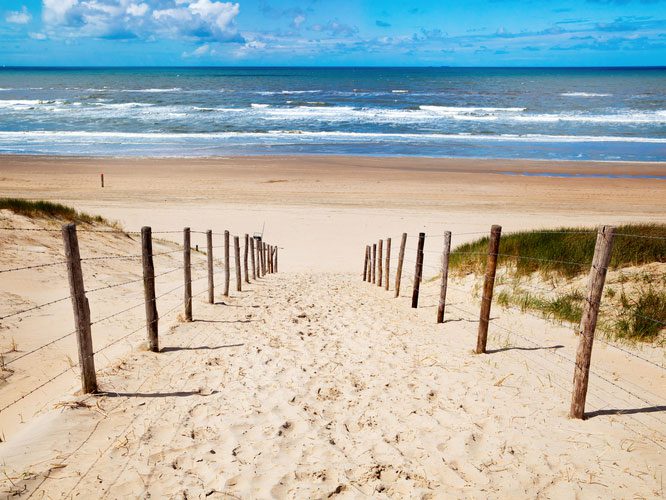 Sportieve afsluiting op het strand